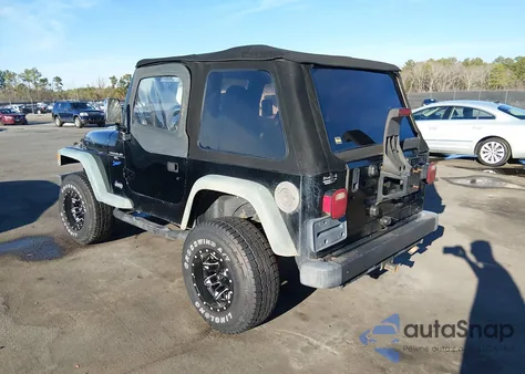 1998 Jeep Wrangler Sport z USA, uszkodzony, nr VIN 1J4FY19S2WP721024